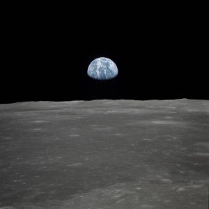 This view of Earth rising over the Moon's horizon was taken from the Apollo 11 spacecraft. The lunar terrain pictured is in the area of Smyth's Sea on the nearside. Photo: NASA