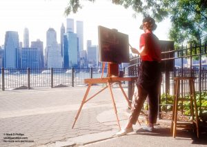 Painter on Brooklyn Heights Promenade with World Trade Center view. ©Mark D Phillips