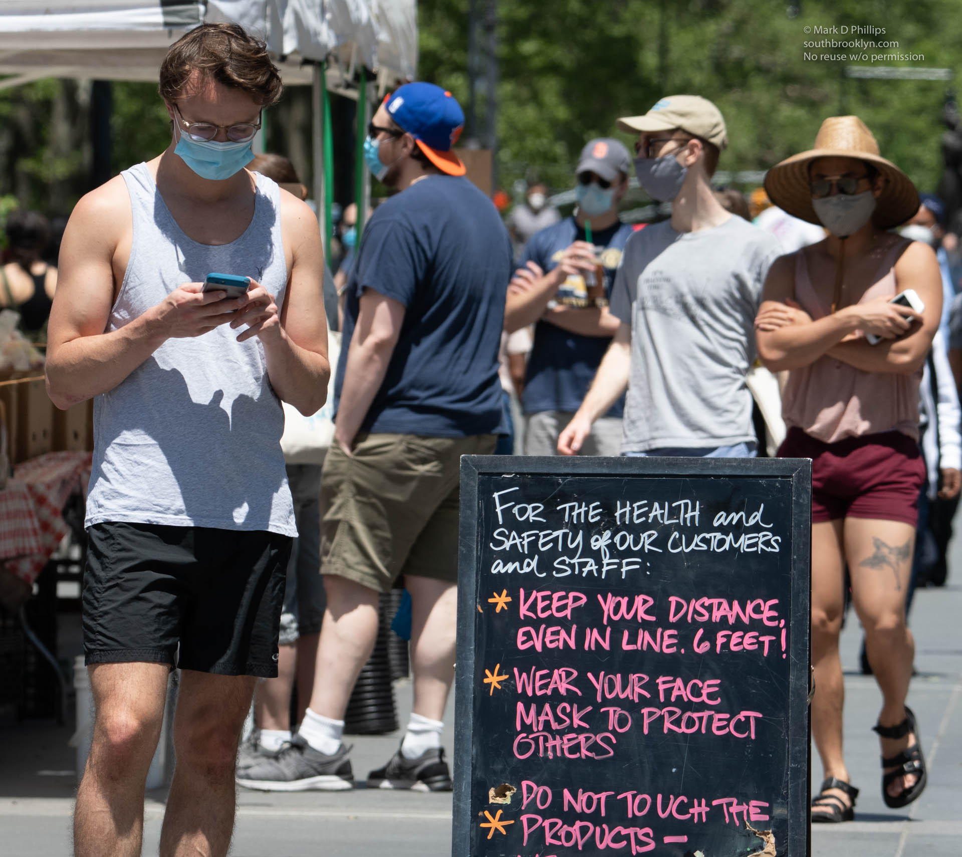 New York City on May 30, 2020, during the Covid-19 pandemic, shoppers at the Brooklyn Heights Farmers Market are greeted with a new reality and new rules. ©Mark D Phillips
