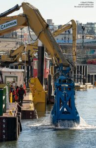 EPA begins dredging the Gowanus Canal in November 2020 by the Carroll Street Bridge. The current cost of the overall cleanup plan is estimated to be over $1.5 billion, and the entire project won’t be completed until mid-2023. ©Mark D Phillips