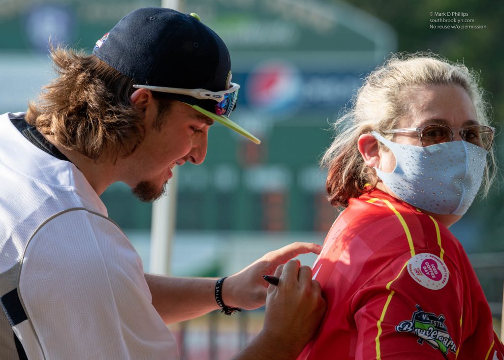 Worcester Bravehearts Jared Kapurch autographs Leah Goldstein's jersey during opening night on May 26, 2021. Photo by Mark D Phillips