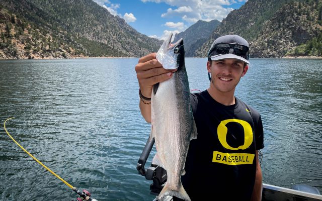 Colorado June 24, 2021: Chuck Bigger nephew Gabe Chambless holds a Kokanee Salmon on Morrow Point Reservoir. ©Chuck Bigger