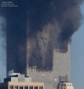 Face in the smoke of World Trade Center on September 11, 2001 just seconds after the second plane struck the south tower. NO REPOSTING. ©Mark D Phillips