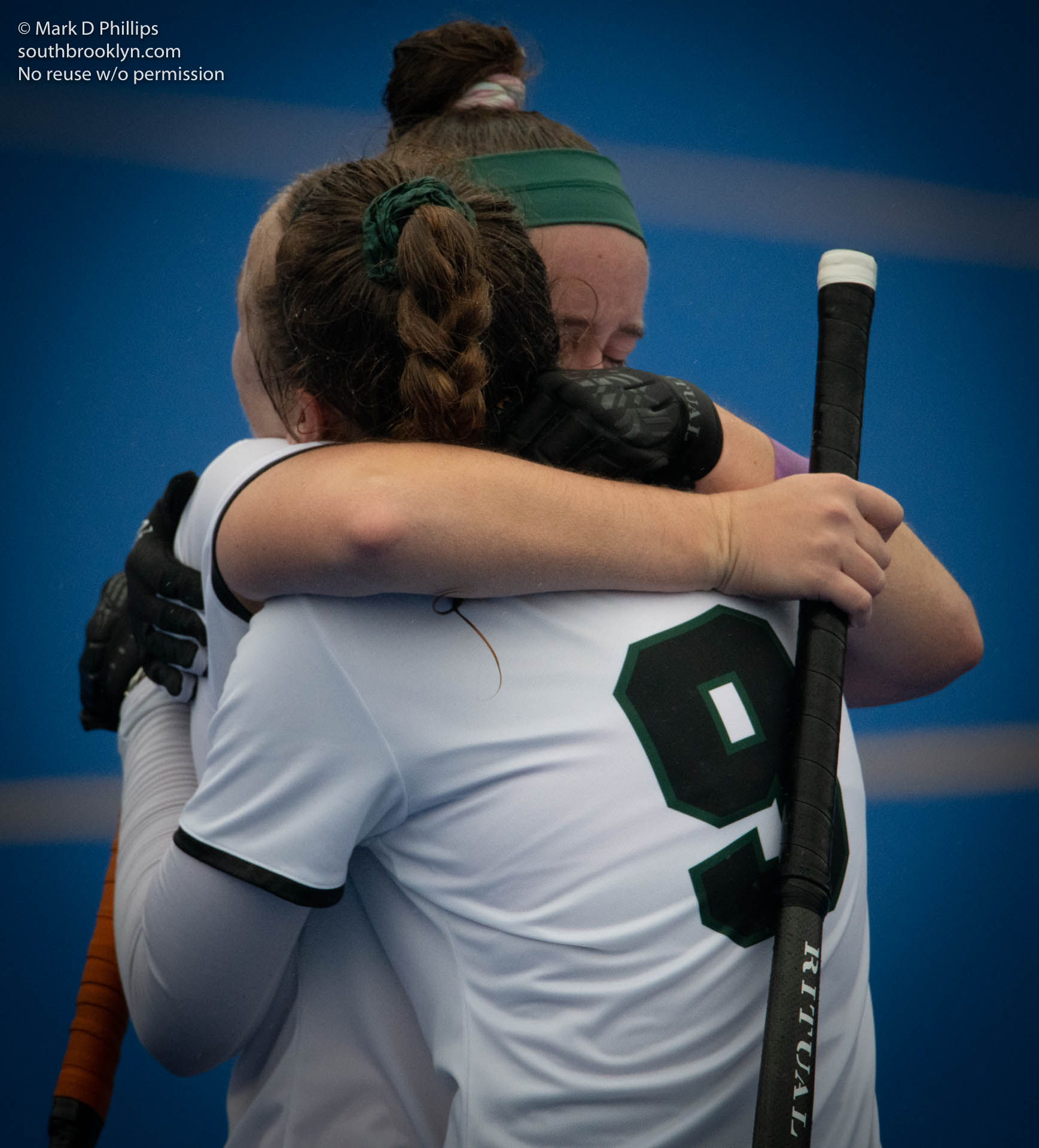 Liza Phillips and Dana Edwards hug after their final game of their final season in their Graduate year as Nichols College Field Hockey plays University of New England on October 30, 2021. ©Mark D Phillips