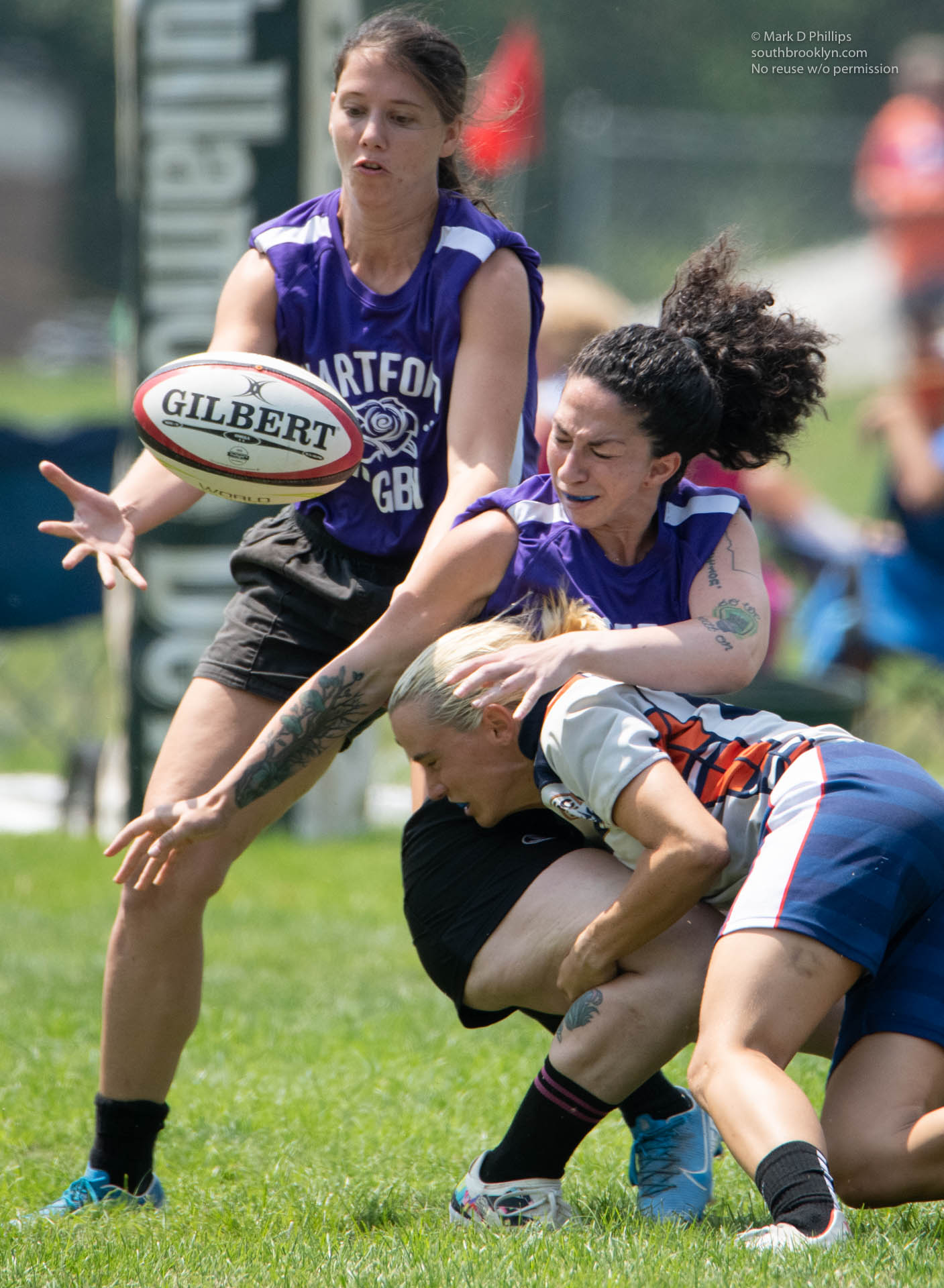 Hartford Roses Aliya Vandal loses the ball on a hard hit but her teammate, Kourtney Davis, is in the perfect position to recover at New Haven 7s tournament in Cheshire, CT, on July 17, 2021. ©Mark D Phillips