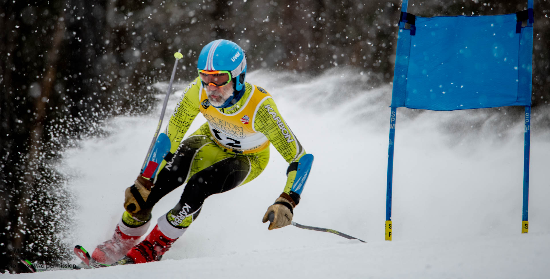 Derek Griggs races in heavy snow at the USSA Masters GS double race at Berkshire East Ski Area in Charlemont, MA. ©Mark D Phillips