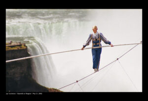 Jay Cochrane skywalks on Clifton Hill in Niagara, Canada, in 2002. The first skywalk in over a hundred years went from the pinnacle of the Sheraton on the Falls Hotel to the Casino Niagara Tower at a height of 40 stories, with Niagara Falls as the backdrop. 