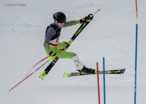 Jesse Stevenson flies through the air after losing the snow during the USSA Masters Eastern Championship Slalom at West Mountain on February 20, 2022. ©Mark D Phillips