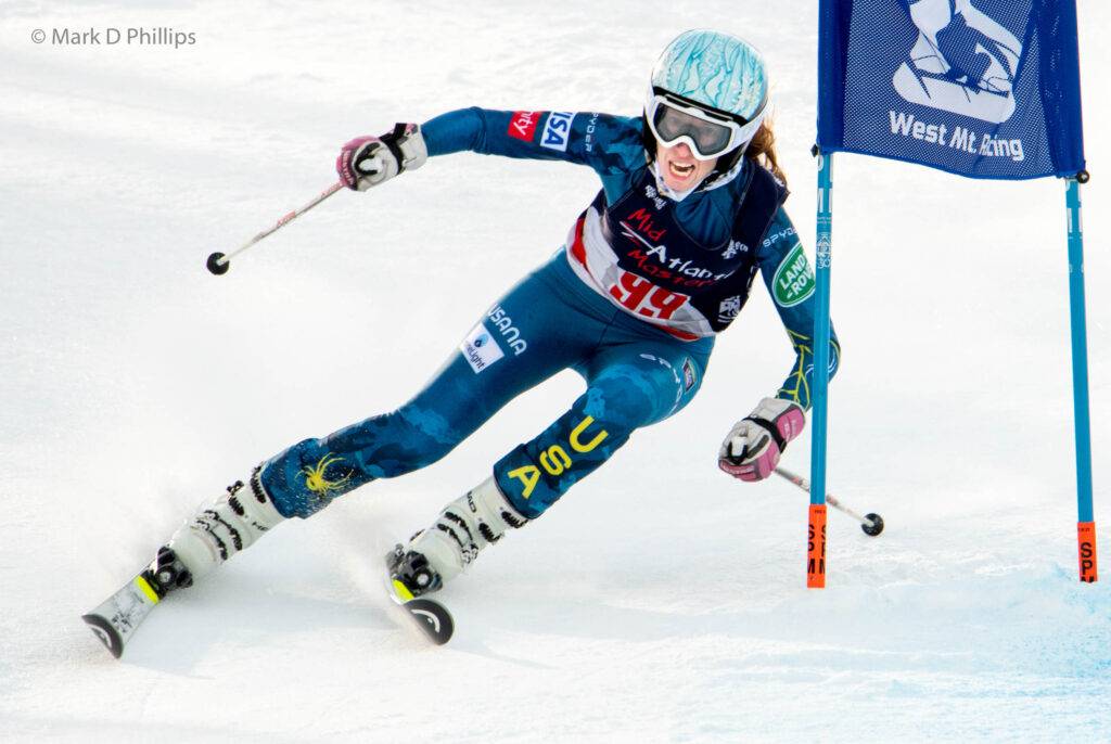 Kerry Finch shouts as she takes a gate on her way to a first place finish at the USSA Eastern Regional Championship Masters GS at West Mountain on February 19, 2022. ©Mark D Phillips