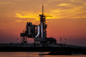 Space Shuttle Discovery at Sunset by Mark D Phillips