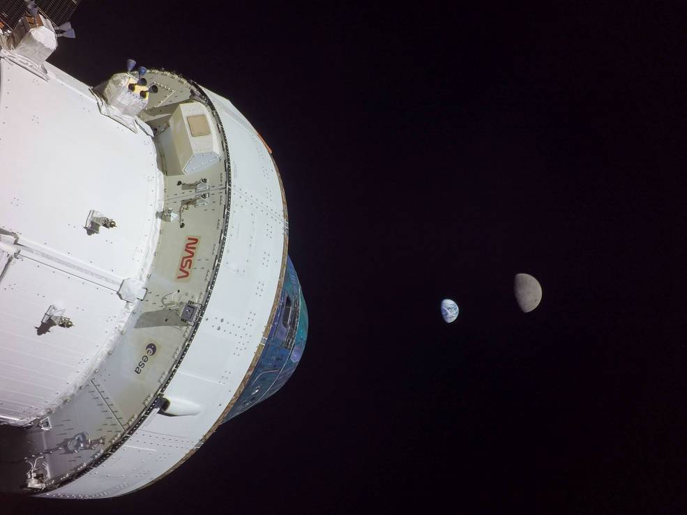 Orion Spacecraft with Earth and Moon
