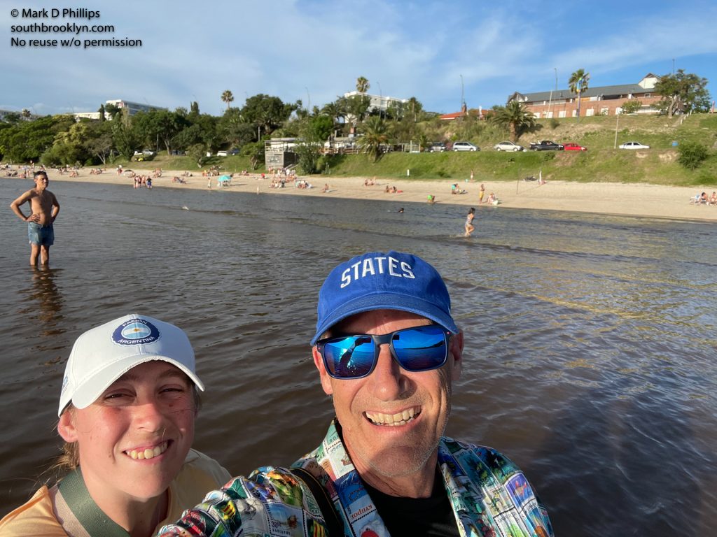 Eliza and Mark Phillips finish their day at Playa colonia, a spectacular beach in Colonia del Sacramento, Uruguay, with the Las Tunas Beach Bar situated with a covered deck on the bluff overlooking